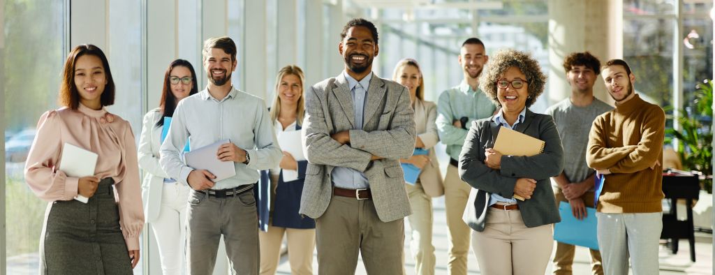 A diverse group of applicants in a bright hallway