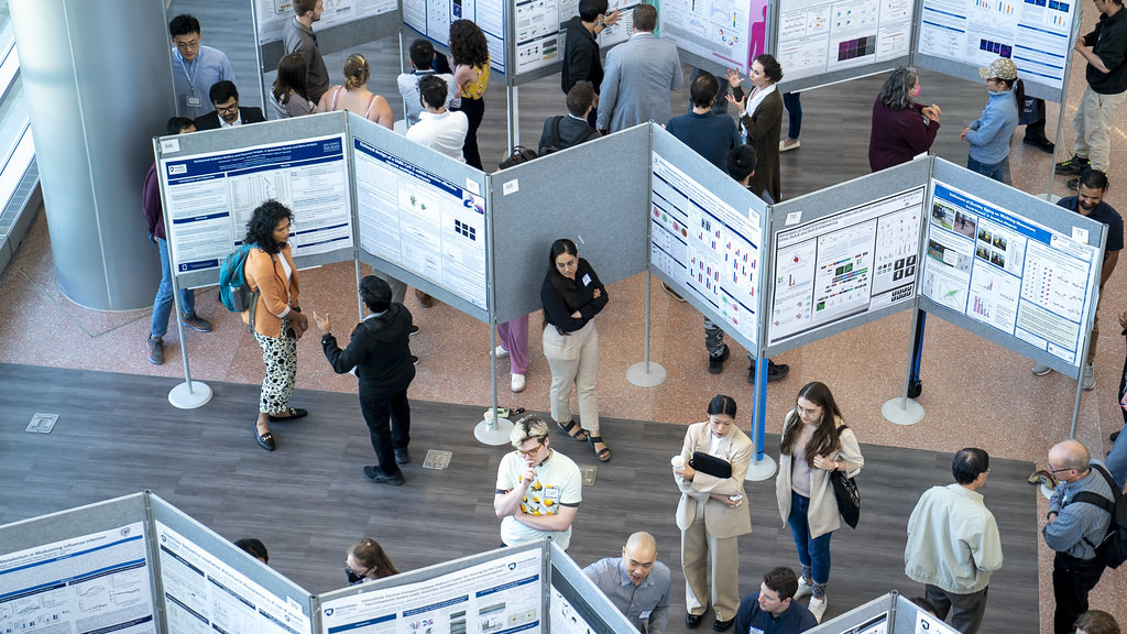 image of trainees standing at posters