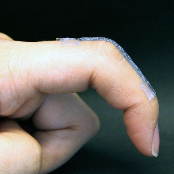Penn State researchers developed a new soft and stretchable material that can be 3D-printed. The material can be used to fabricate wearable devices, such a sensor that can be worn on a finger, as shown here. Credit: Marzia Momin. All Rights Reserved.