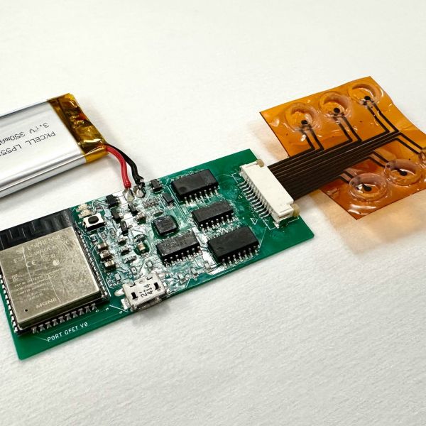 The biosensing platform developed by Penn State engineering researchers incorporates two-pass laser induced graphene with commercial transistors to simultaneously test for SARS-CoV-2 and vitamin C.   Credit: Heshmat “Amir” Asgharian / Penn State. All Rights Reserved.