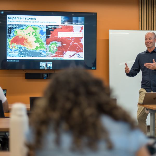 Paul Markowski, head of the department of meteorology and atmospheric science at Penn State, presents tornado research at the Penn State-hosted workshop titled "Improving the Prediction and Communication of Weather/Climate Extremes in Africa and the United States." Credit: David Kubarek / Penn State. Creative Commons