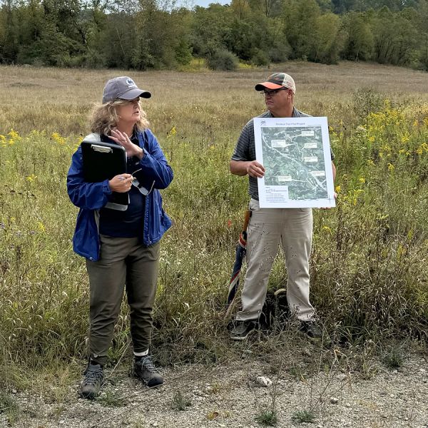 Carolyn Mahan, professor of biology and environmental studies at Penn State Altoona, and Mike Retterer of Pheasants Forever explain the research approach to understanding habitat management along the Falcon Pipeline Right-of-Way in southwestern Pennsylvania. Credit: Penn State. Creative Commons