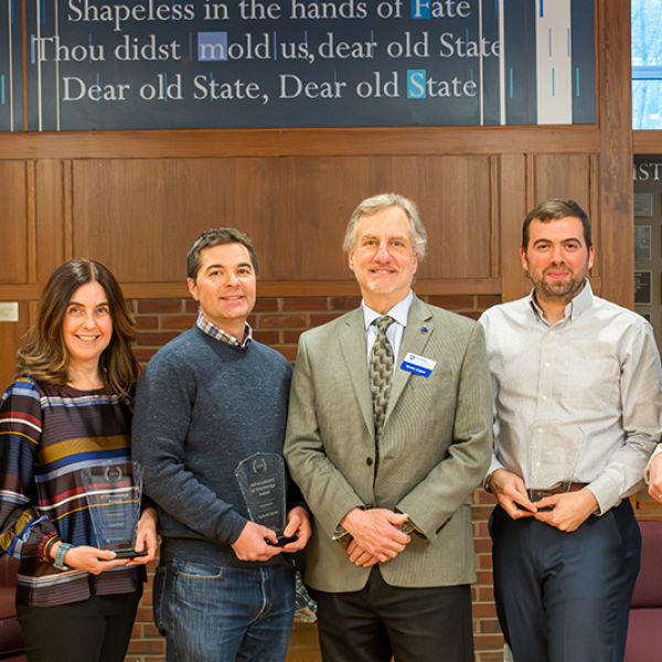 Director Bruce Logan, fourth from left, stands with the IEE Research Award winners. From left to right are: Hong Wu, Lisa Emili, Nathaniel Warner, Brian Fronk and Margaret Busse. Lauren McPhillips is not pictured. Credit: Brenna Buck. All Rights Reserved.