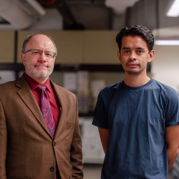 Thomas Gould and Carlos Novoa in Gould's laboratory at Penn State University Park. Credit: Dennis Maney / Penn State. Creative Commons